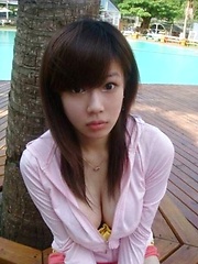 Selfmade photos of busty Asian babe at home
