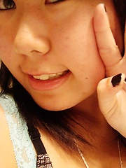 Pretty sexy asian girlfriend strips her clothers and shows nude tits