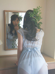 Neo Asian babe in see through dress is like goddess from ocean