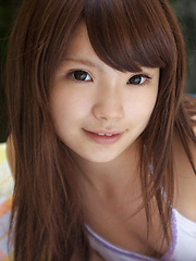 Manami Sato Asian takes school uniform off and shows body outdoor