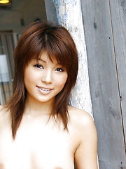 Beautiful Asian babe enjoys showing off her hot clothes