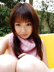 Asian teen flaunts her nice tits and firm ass